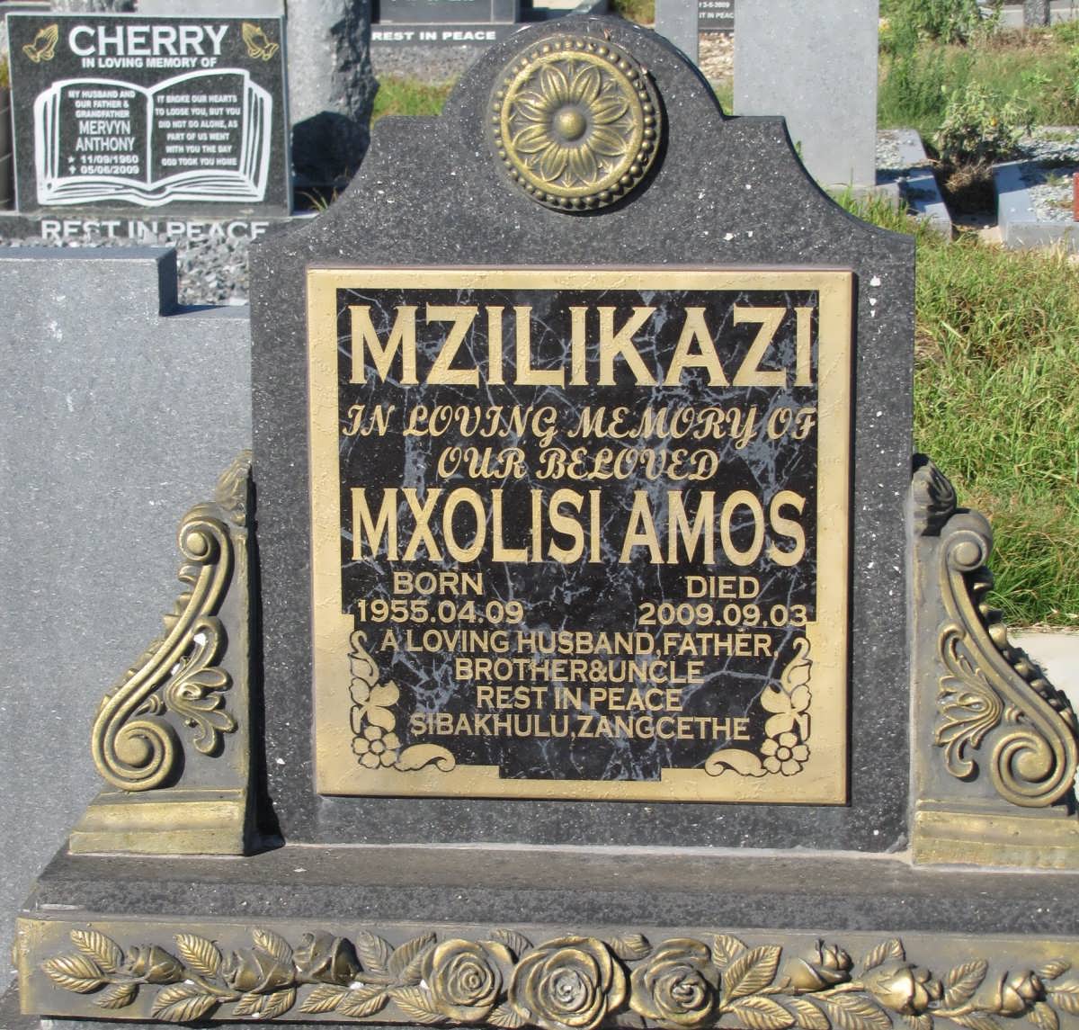 MZILIKAZI Mxolisi Amos 1955-2009