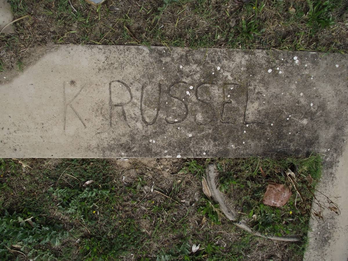 RUSSEL K. 1920-1987