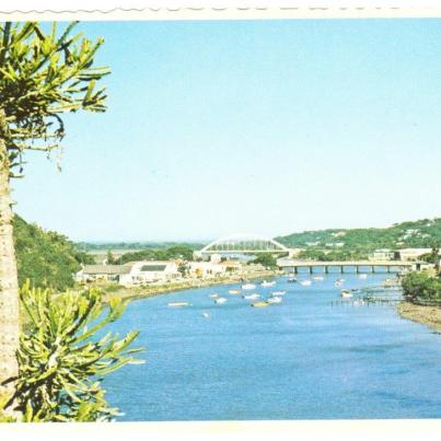 Port Alfred - The old Putt Bridge and the new, arched Nico Malan Bridge across the Kowie River